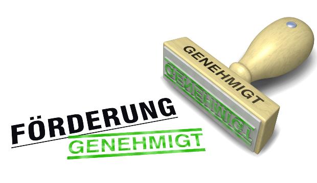 Unter das Wort Förderung wurde mit einem Stempel das Wort "genehmigt" gestempelt.